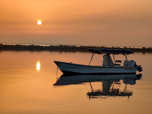 Beautiful sunrise on the beach by suliman-SA,