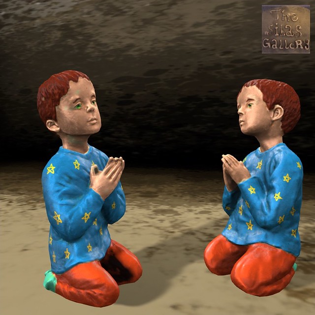 Child praying figurine