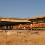 California HSR/BNSF freight Wasco Viaduct (1579) What I was not able to photograph when here in 2021, a conventional BNSF freight headed under the High-Speed Rail (HSR) Wasco Viaduct.

Click &lt;u&gt;&lt;a href=&quot;https://www.flickr.com/photos/donbrr/51330779357&quot;&gt;here&lt;/a&gt;&lt;/u&gt; for more information/reflection on the HSR.
