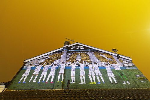 A Leeds United AFC mural, painted on the side of a house near to Leeds United Football Ground on Elland Road