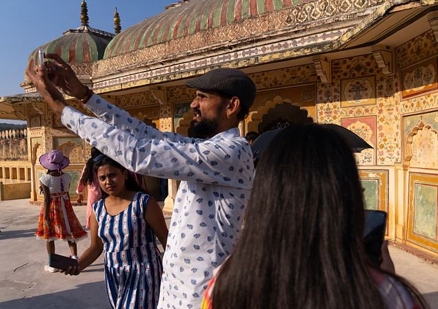 Indian tourists taking selfie in Amber Fort, Rajasthan, Amer, India
