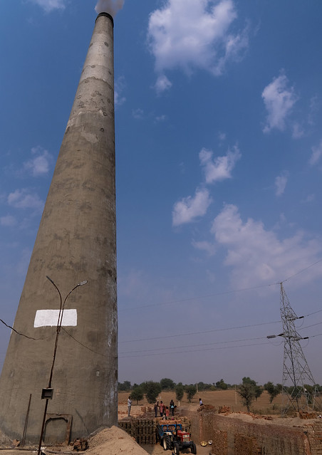 Brick factory chimney in the countryside, Rajasthan, Mandawa, India