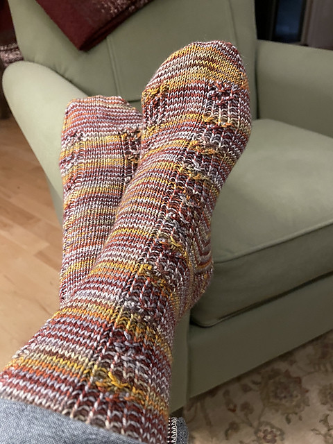 Debbie (@love.knit.spin.weave) finished this pair of Ravishing Socks by Nancy Wheeler with twisted rib and lace.