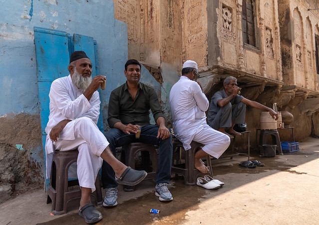 Indian men drinking tea in the street, Rajasthan, Ramgarh Shekhawati, India