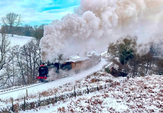 Snow and steam - J27 65894 blasting past Darnholm