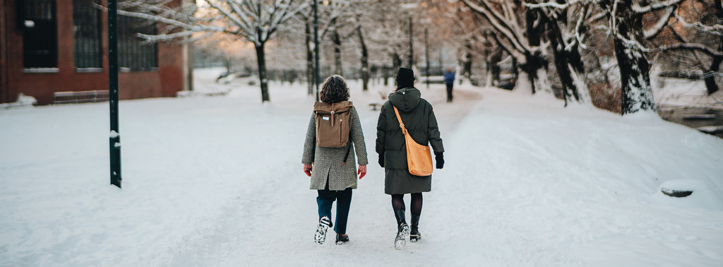 People walking on a snowy road