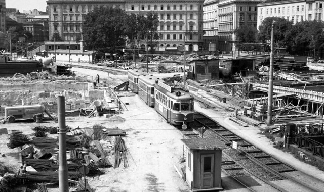 Trams across a building site