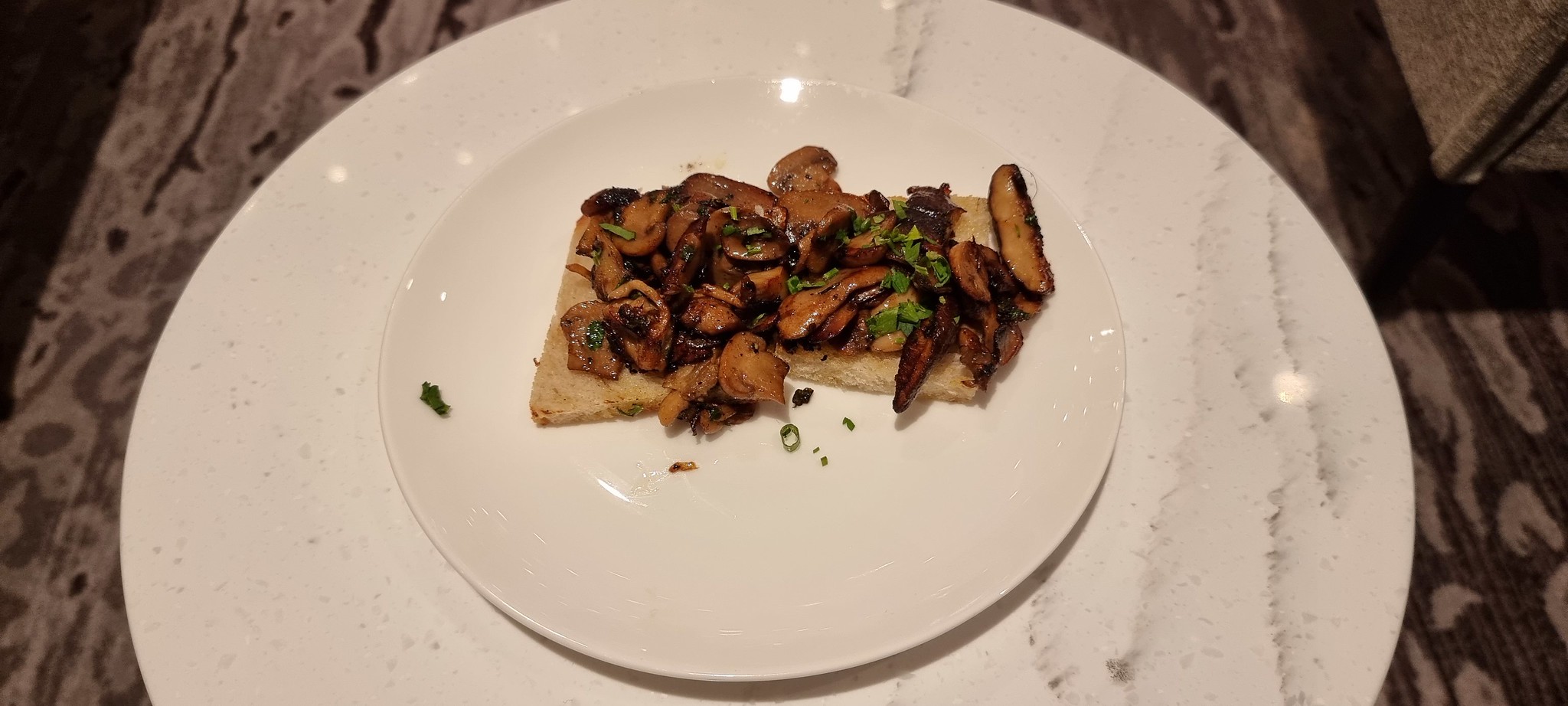 The wild mushroom toast in the Chelsea Lounge at JFK T8