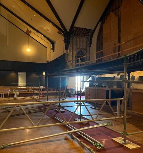 Auditorium floor and stage with scaffolding