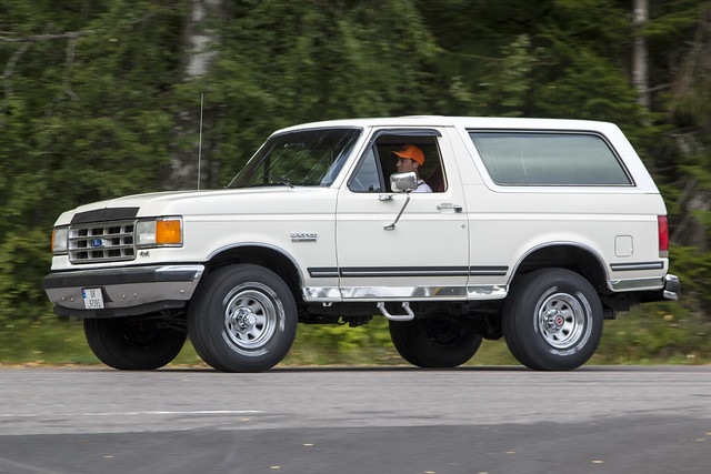 A white Ford Bronco without a police escort