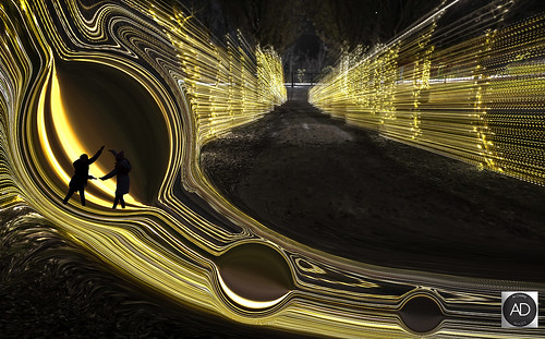 surreal lenszoomtechnique specialeffects art nightphotography wirral park openspaces england uk people teardrops glow community dreamlike gold lighttrails liquid