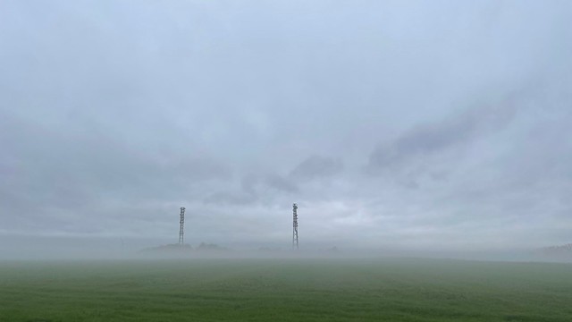 same radio towers but in foggy mood