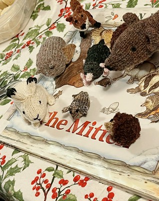 Sandi (Sandima) knit this collection of mini animals from multiple Ravelry patterns to go with the book The Mitten.