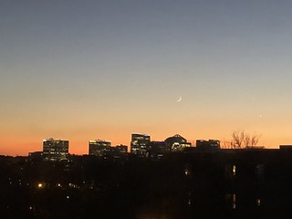Sunset sky with crescent moon, Rosslyn skyline from Georgetown, Washington, D.C.