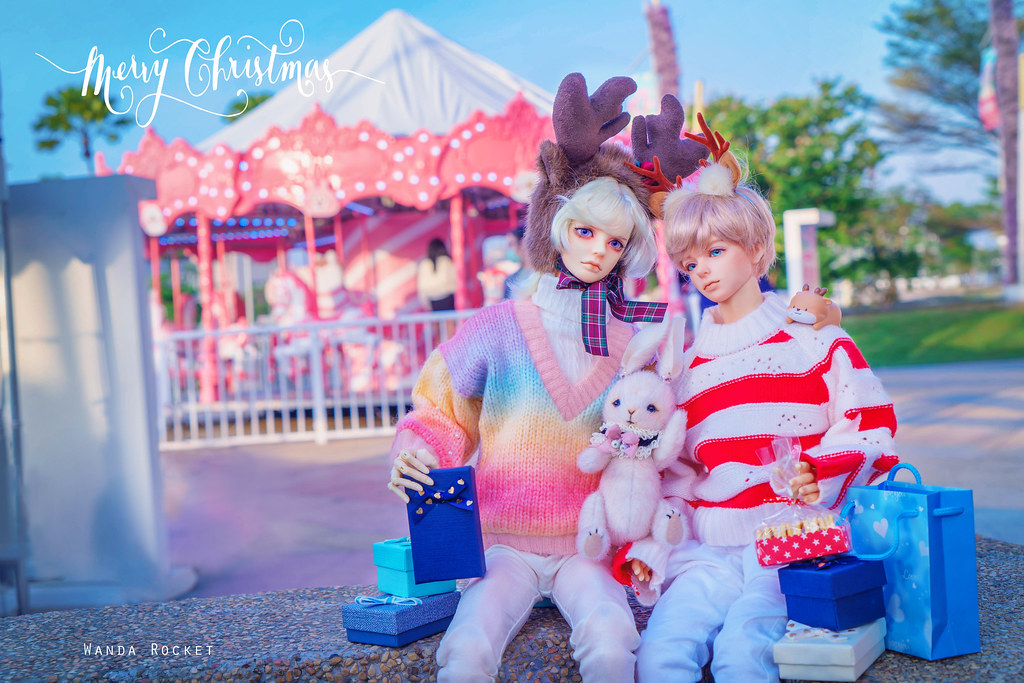At A Pink Amusement Park with many Xmas Gifts