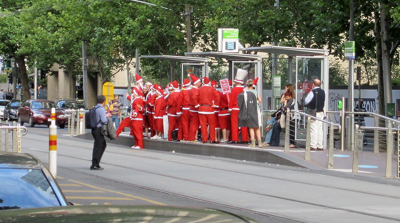 Santas at a tram stop (December 2012)