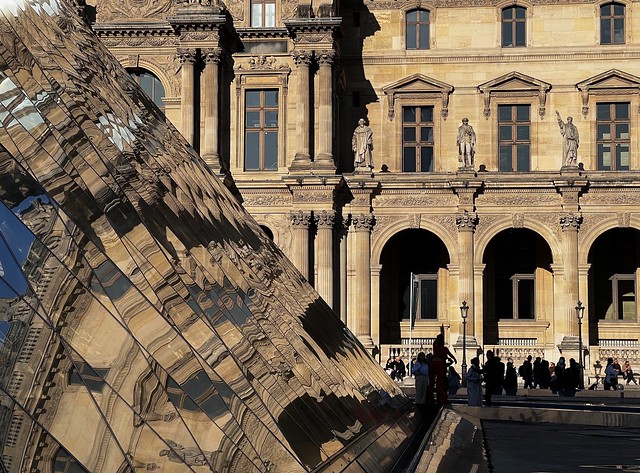 The Louvre in Paris reflected in the now iconic glass pyramid. 