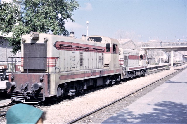 Israel Railways - Israel State Railways - ISR diesel locomotive Nr. 102 and Type G12 diesel locomotive at Haifa Central station