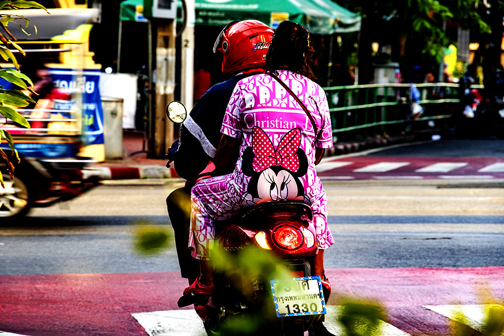 Woman on back of motorbike with Minnie Mouse on her ass on 12-30-22--Bangkok copy