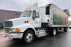 Sysco Sterling AT9500 103650 with Hyundai 28 refrigerated trailer 242922