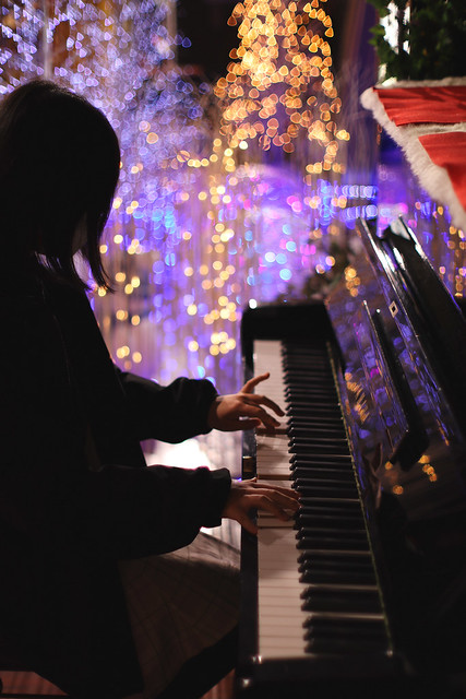 Sakurako plays street piano.