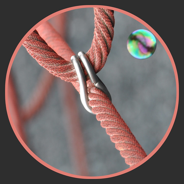 A Soap Bubble Floating Past the Encircled Rope