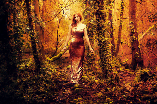 Beautiful Redhead Woman in the Woods