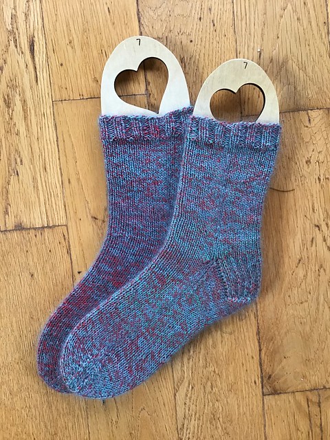 These are Patti (@patnelann)’s second pair of socks. This is DK Weight Vanilla Socks by Kay Litton, thecrazysocklady. Yarn is Cascade Waves Sock and Drops Kid Silk.