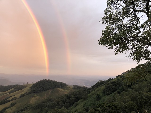 Rainbow in a dark morning in the mountains of Itajubá