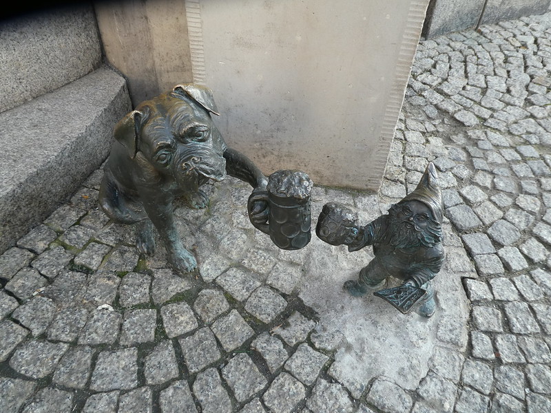 A gnome and a dog in Wroclaw city centre