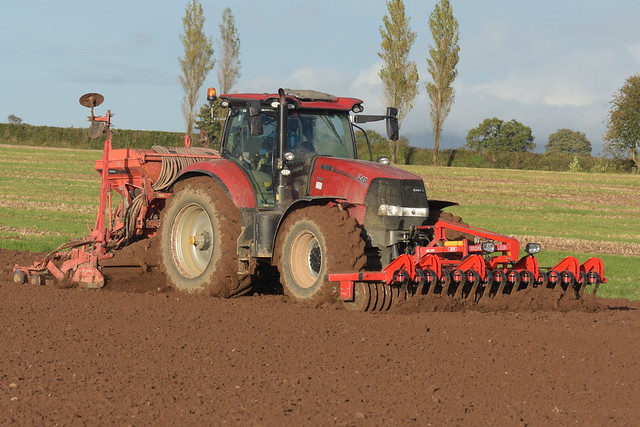 Case IH Puma 240 CVX Tractor with a HE-VA 400 Frontroller Front Press & Kuhn Combiliner Venta LC402 One Pass Seed Drill