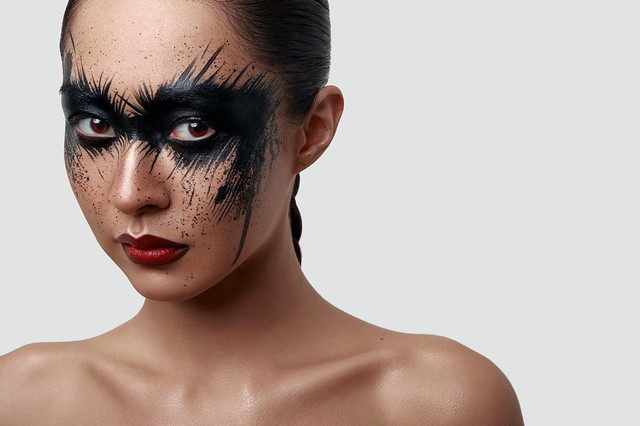 Beauty young Woman with Halloween creative Makeup
