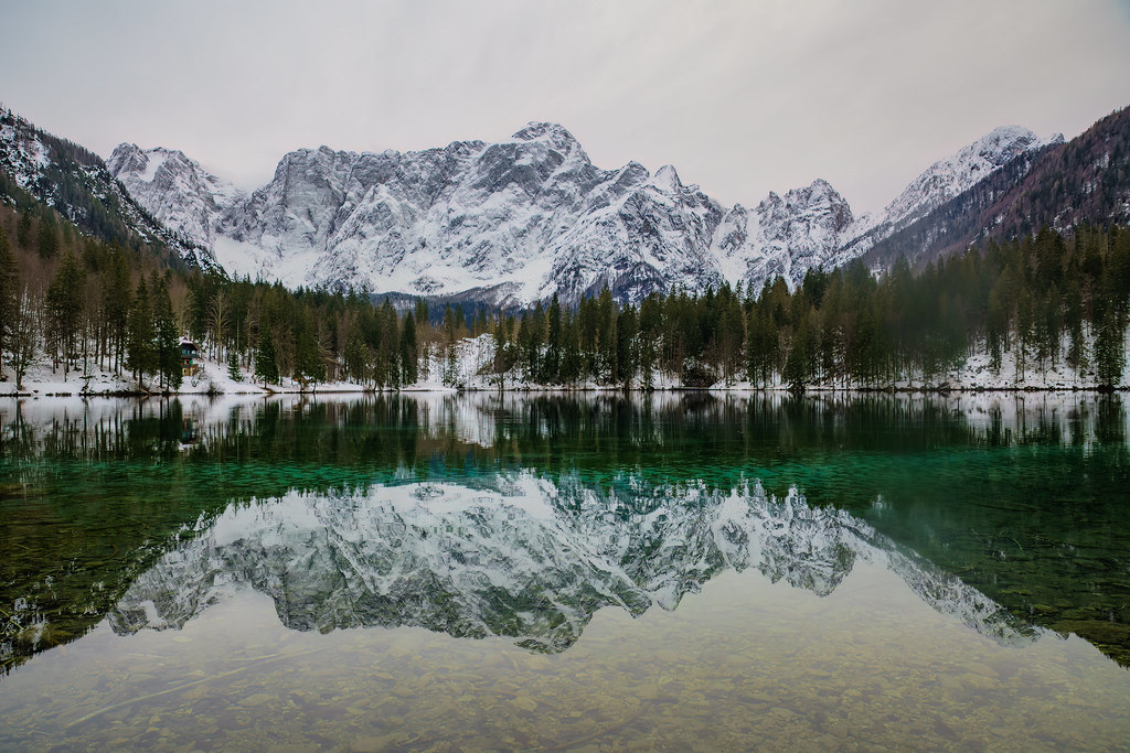 Winter reflections at Fusine lake