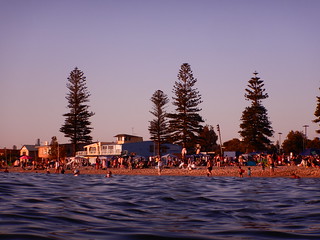 Busy Elwood Beach at sunset on a hot 39c Summer Saturday