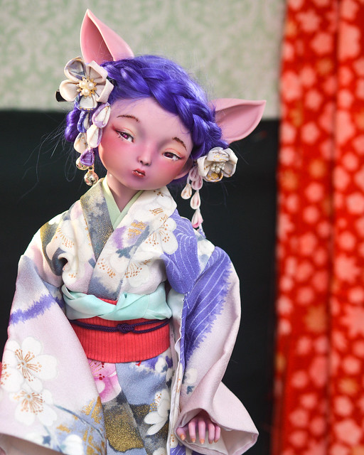 Kosuzu in purple kimono.