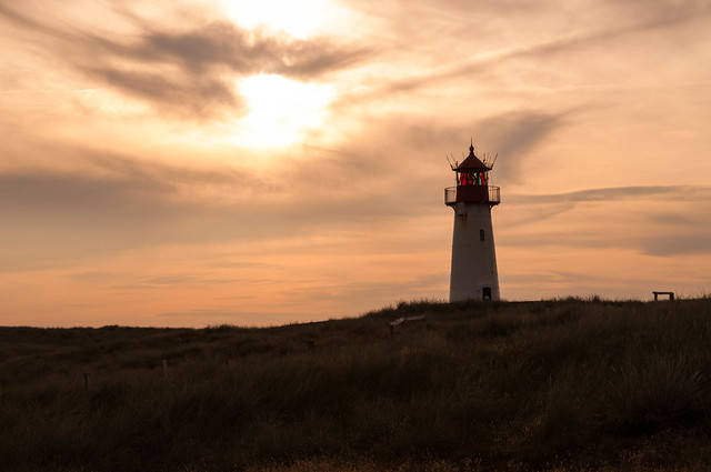 lighthouse in the setting sun