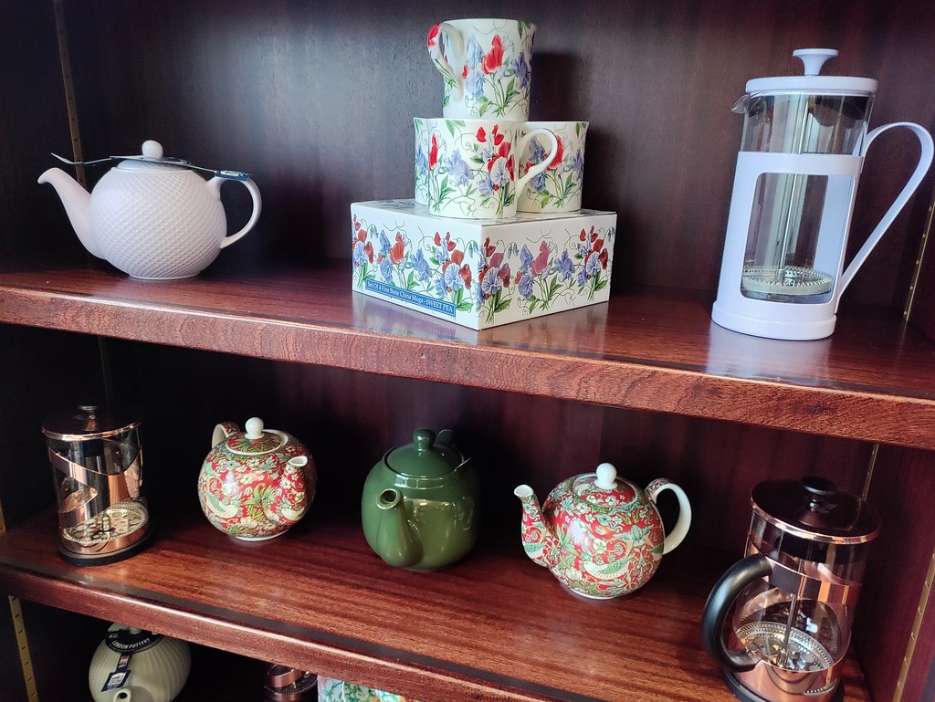 Tea and coffee pots adorn the walls at Northern Tea Merchants Cafe