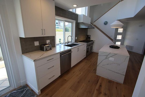 #DesignBuild Modern Transitional Complete Home, #KitchenRemodel with custom #whitecabinets & #woodflooring https://www.aplushomeimprovements.com/portfolio_page/139-design-build-modern-transitional-home-kitchen-remodel/