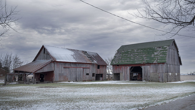 Red Barns with Dusting of Snow