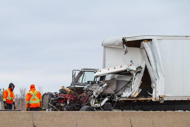 Serious Collision Between Box Truck and Road Maintenance Blocker Vehicle on QEW in Beamsville