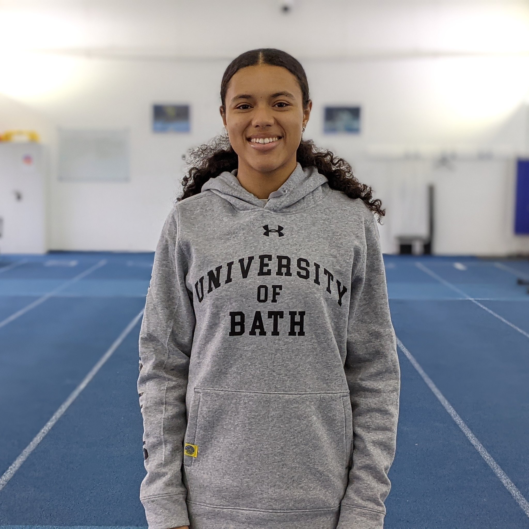 Aleeya Sibbons wearing a University of Bath hoodie