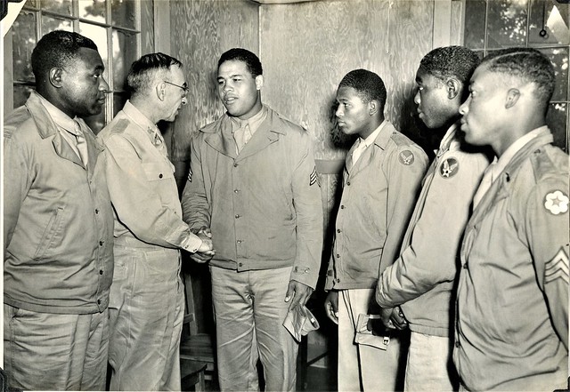 At Post Headquarters, Sergeant Joe Louis Barrow and members of his party met Colonel Andrew G. Gardner, Post Commander.