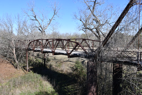 Old County Route 117 San Antonio River Bridge (Wilson County, Texas) Abandoned historic truss bridge on FM 775 over the San Antonio River in Wilson County, Texas.  Bypassed by a new bridge in 1986.  The bridge was constructed ca. 1885 and originally carried CR 117 between Canada Verde and Calavaras.  The bridge consists of a Camelback through truss with subdivided panels and Warren pony truss with polygonal top chord approach spans.

Historic American Engineering Record (HAER No. TX-68)