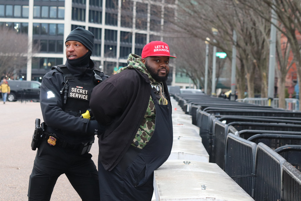 pro-Trump rapper Ron J Spike gets detained outside the White House for shoving a woman at the pro-choice Women's March