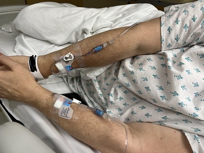 Carrie Showing Off Two IV’s While in Hospital