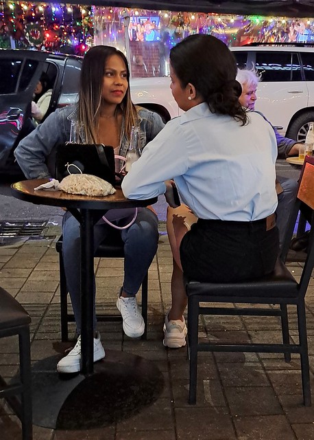Girls in a Street Café Medellin Colombia