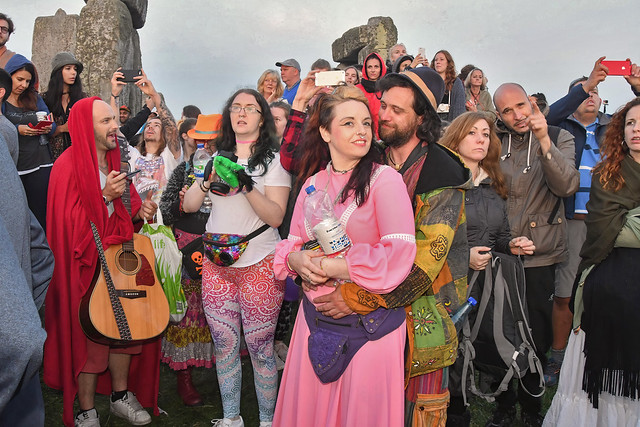 Neo Pagans and others at sunrise on the solstice at Stonehenge