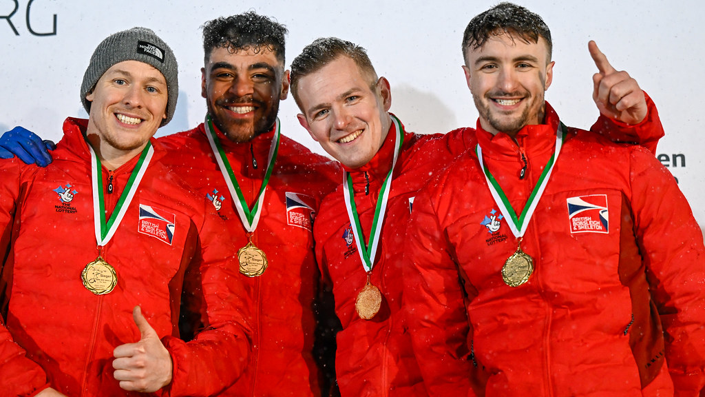 The GB four-man bobsleigh team celebrate their European Championships gold medal. CREDIT: IBSF