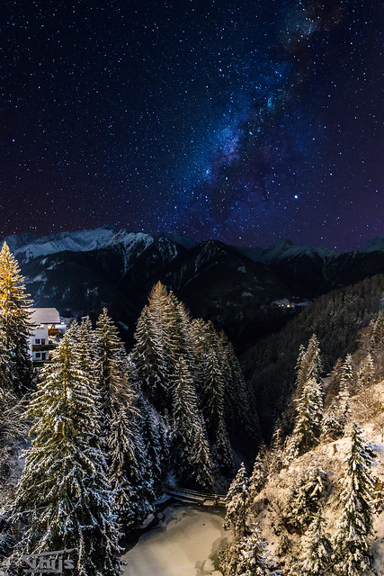 Snowy landscape with Milkyway
