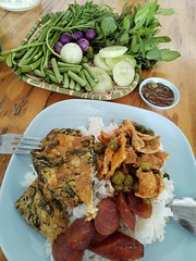 Mixed rice in Thailand, comes with vegetables to eat raw